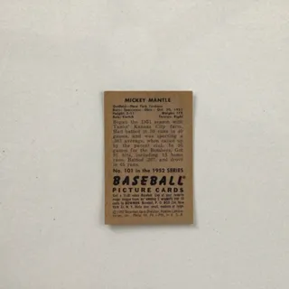 Photo of Mickey mantle baseball card #101 as shown. Used. Good Condition. Dated 1952.