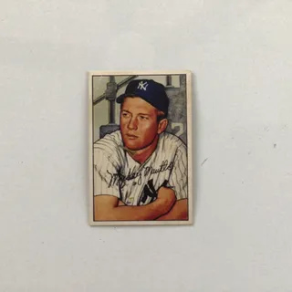 Photo of Mickey mantle baseball card #101 as shown. Used. Good Condition. Dated 1952.