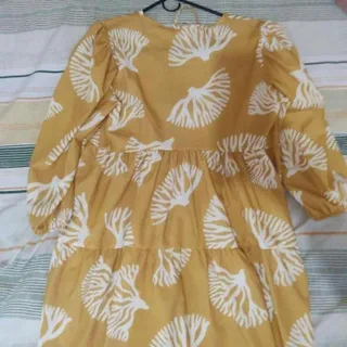 Photo of Short yellow floral dress with