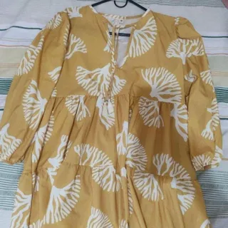 Photo of Short yellow floral dress with